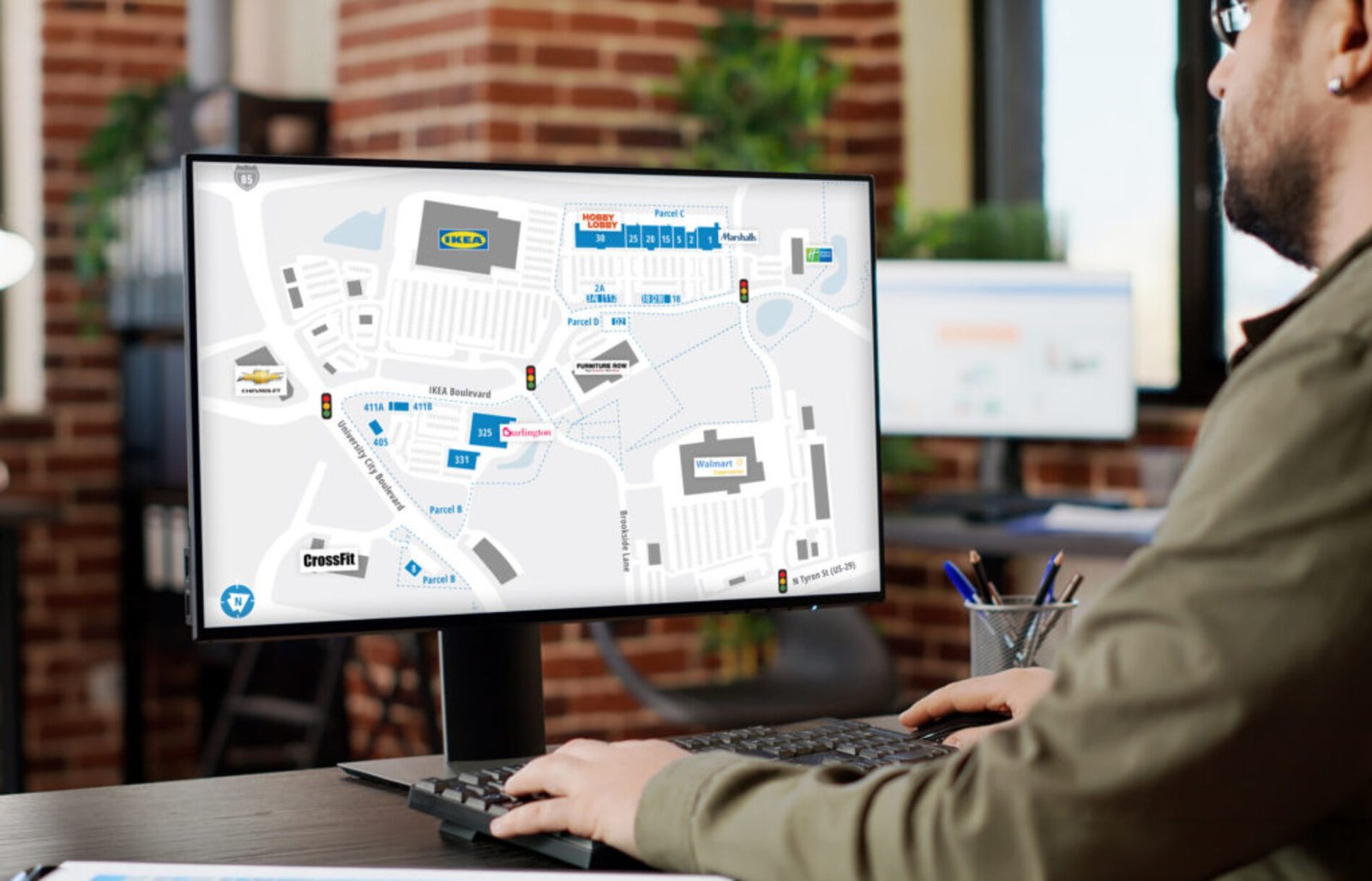 Businessman working on monitor with greenscreen template